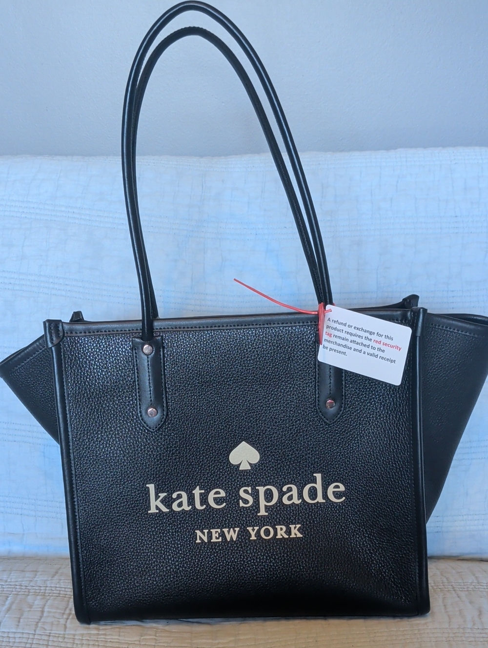 kate spade black leather logo tote with gold accents